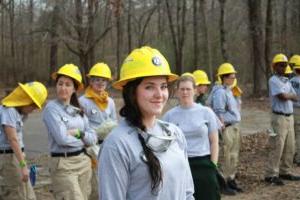 Conservation Corps members in the woods
